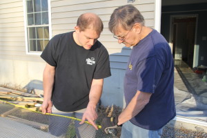 © COPYRIGHT 2015 Eddie's Aviary Finally, the wire!! Here my husband and father and law measure twice and cut once 